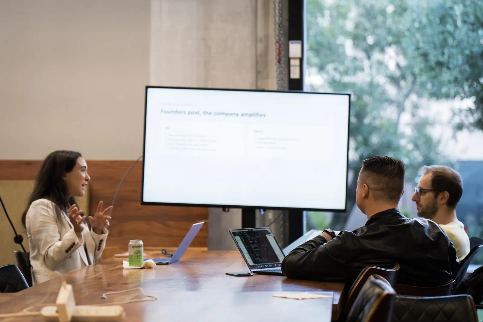 Allie Gross presenting her LinkedIn ads workshop, with the slide Founders post, the company amplifies on screen