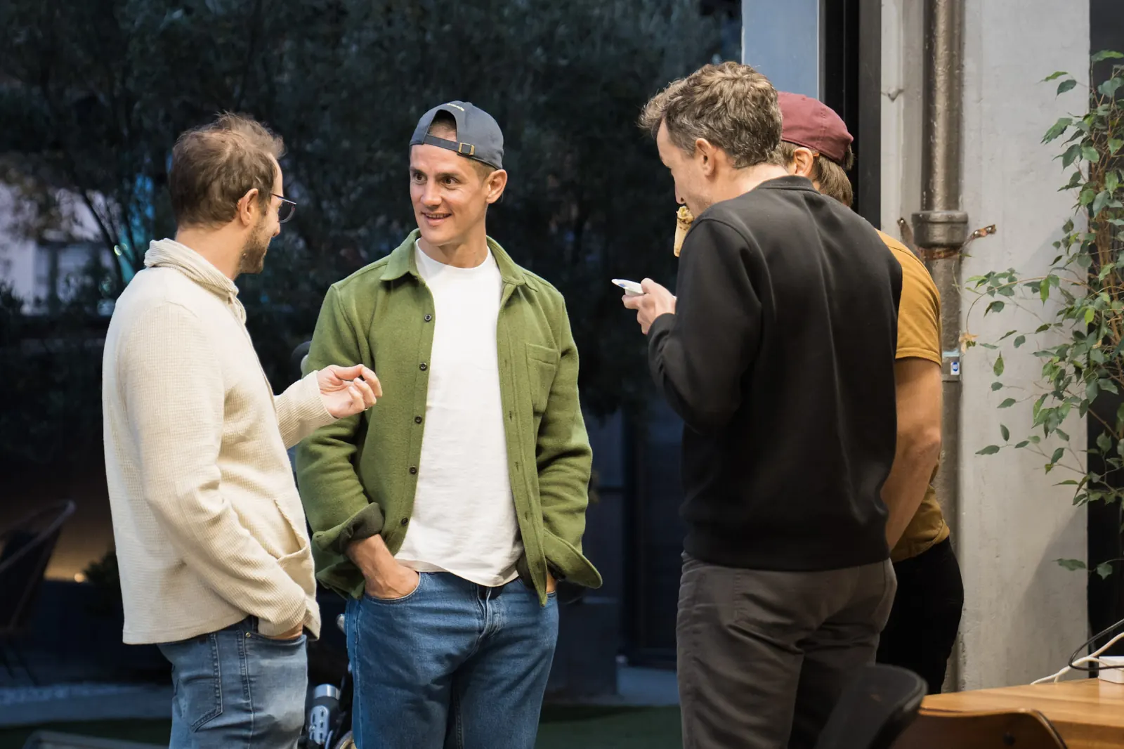 Robin Choy talking with attendees in the Wefunder courtyard after the workshops